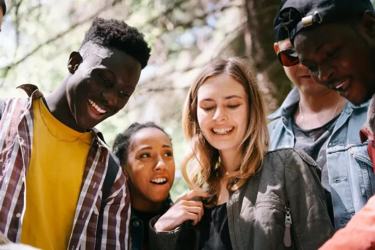 group of teens smiling together